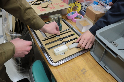 3S活動で収納用品を試作している写真